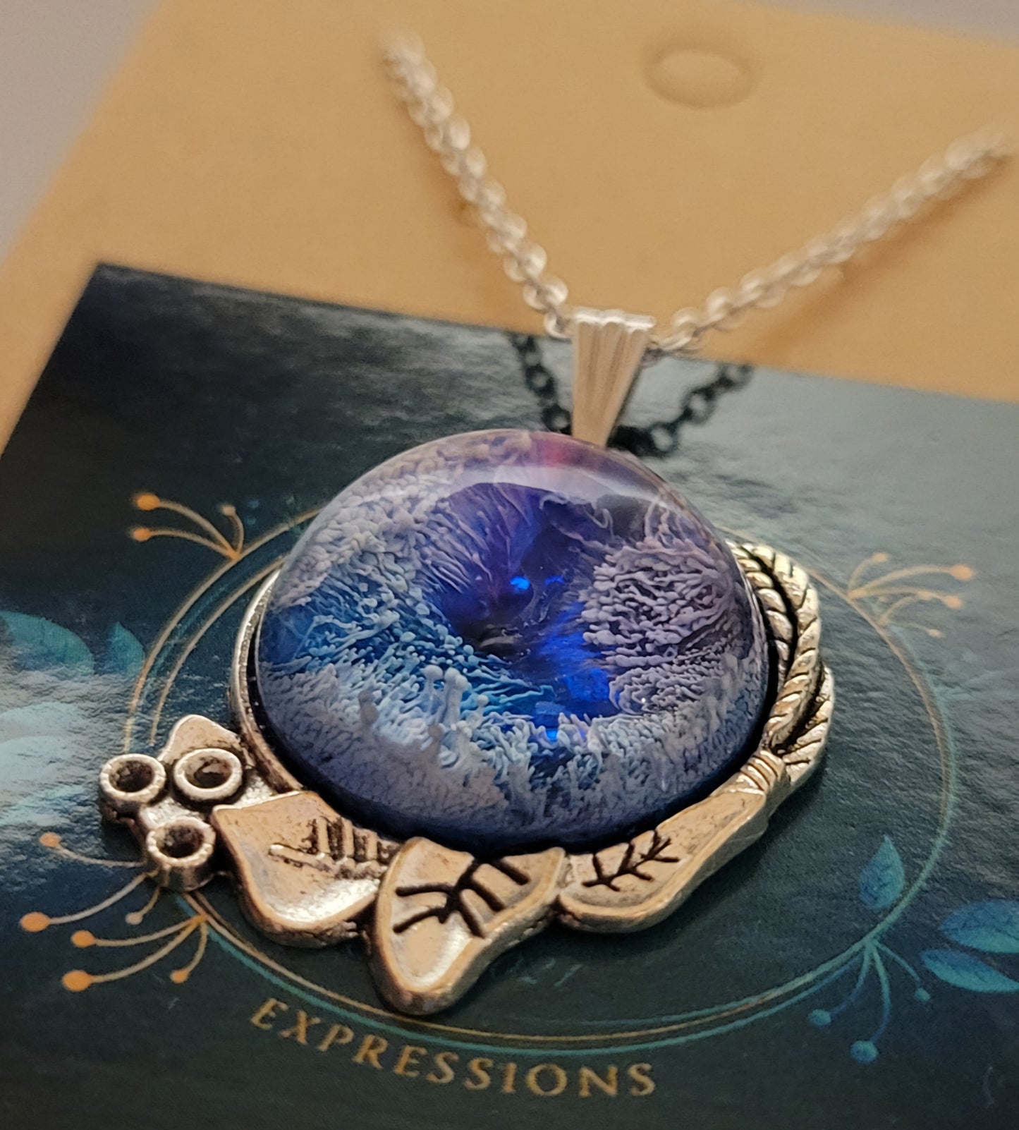 Handmade Resin Art Pendant with 18 inch silver plated necklace chain.