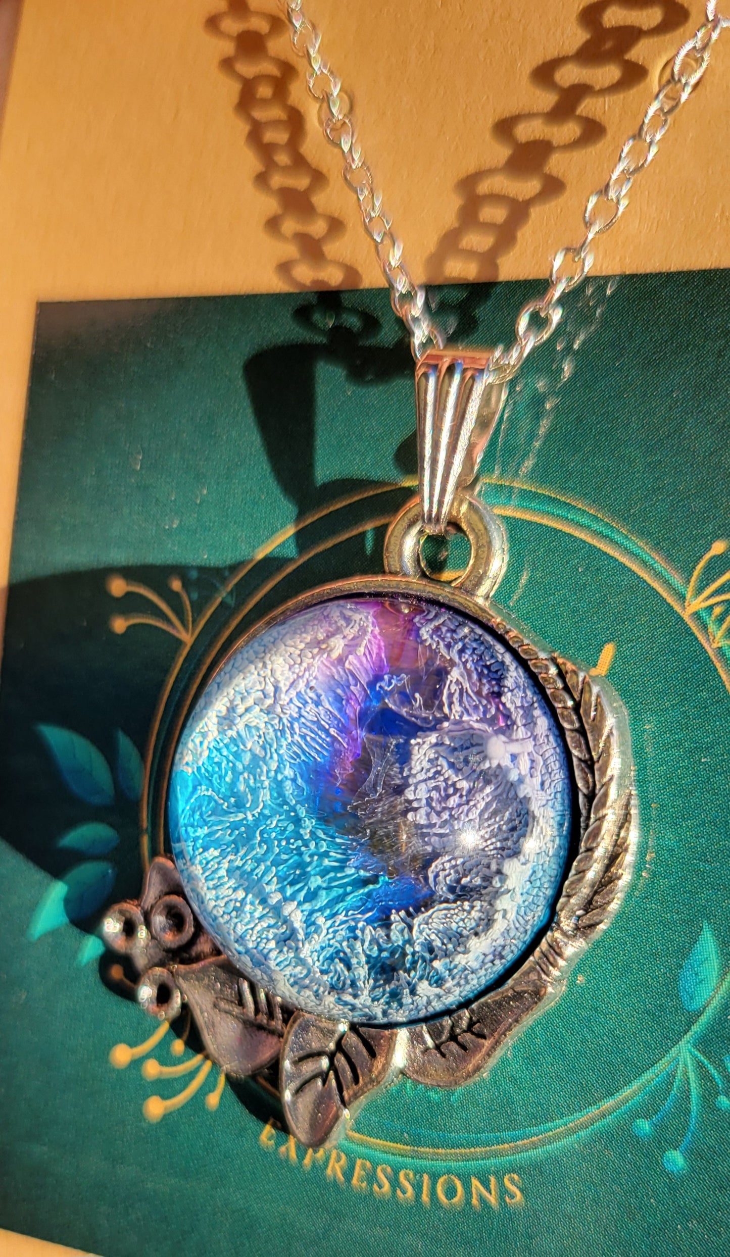 Handmade Resin Art Pendant with 18 inch silver plated necklace chain.