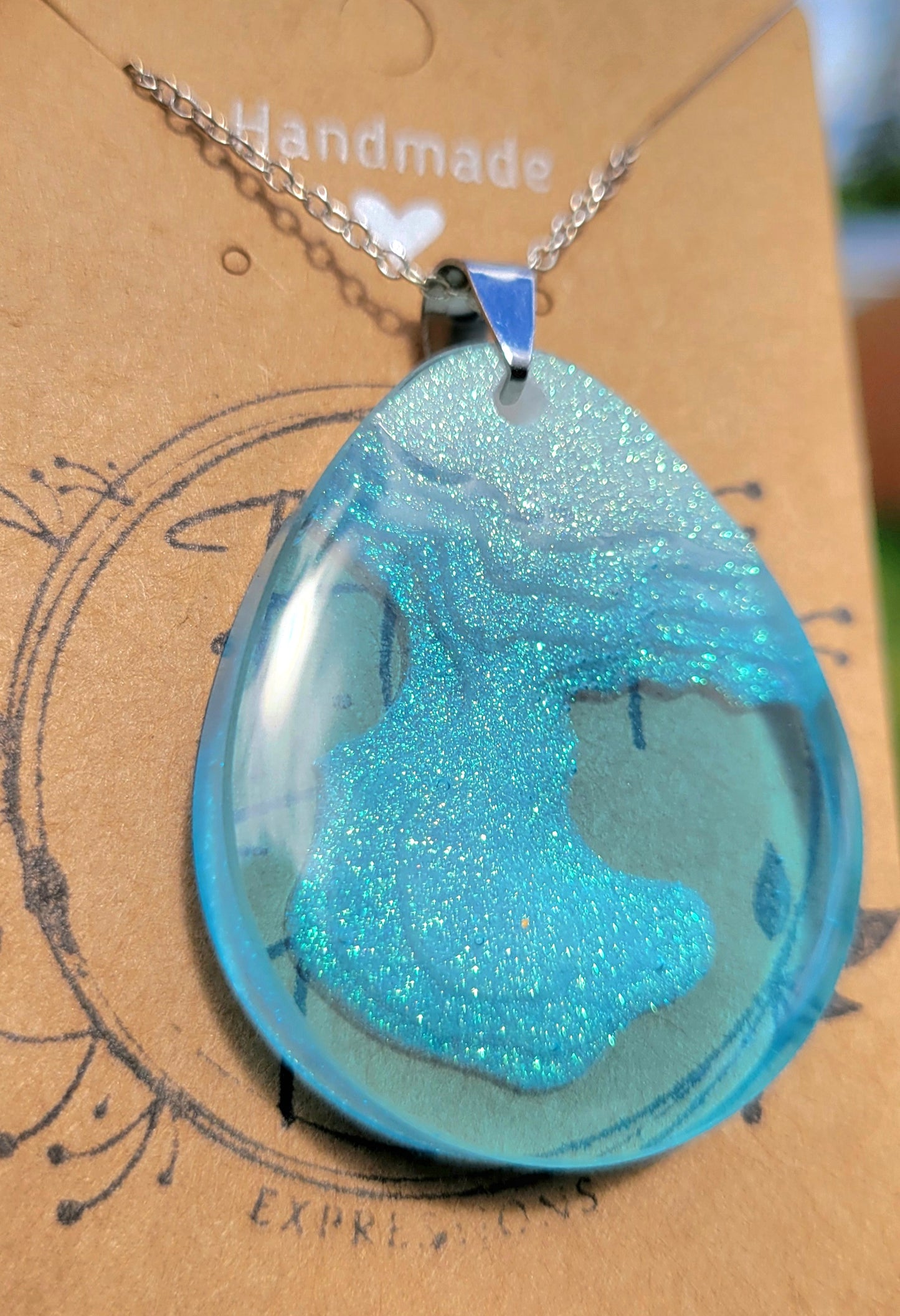 Handmade Resin Art Pendant on a 20 Inch Silver Chain