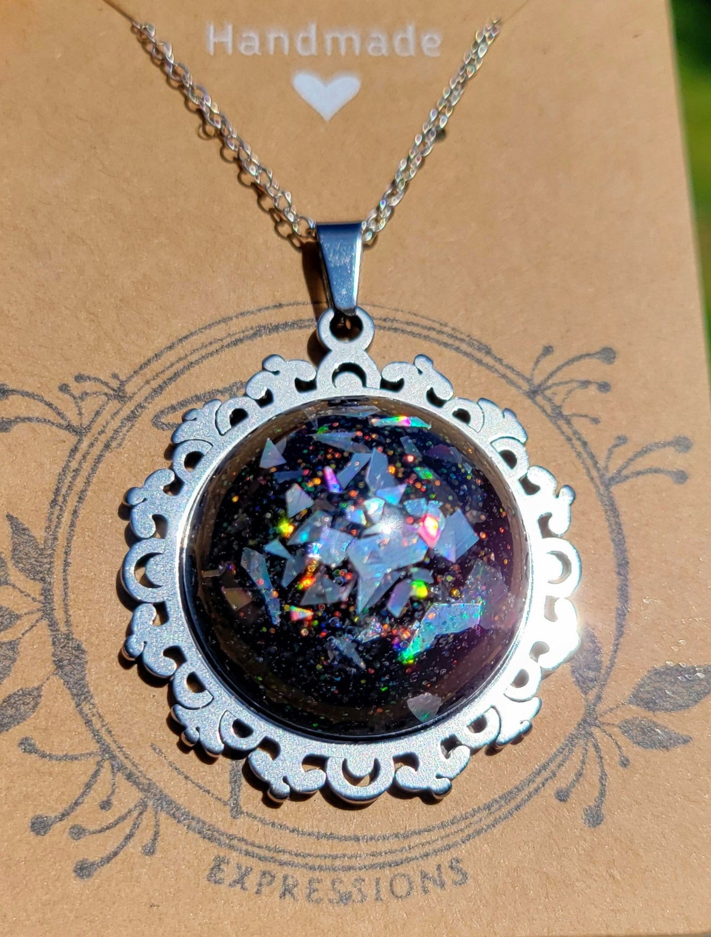 Handmade Resin Art Pendant with 20 inch silver plated necklace chain.