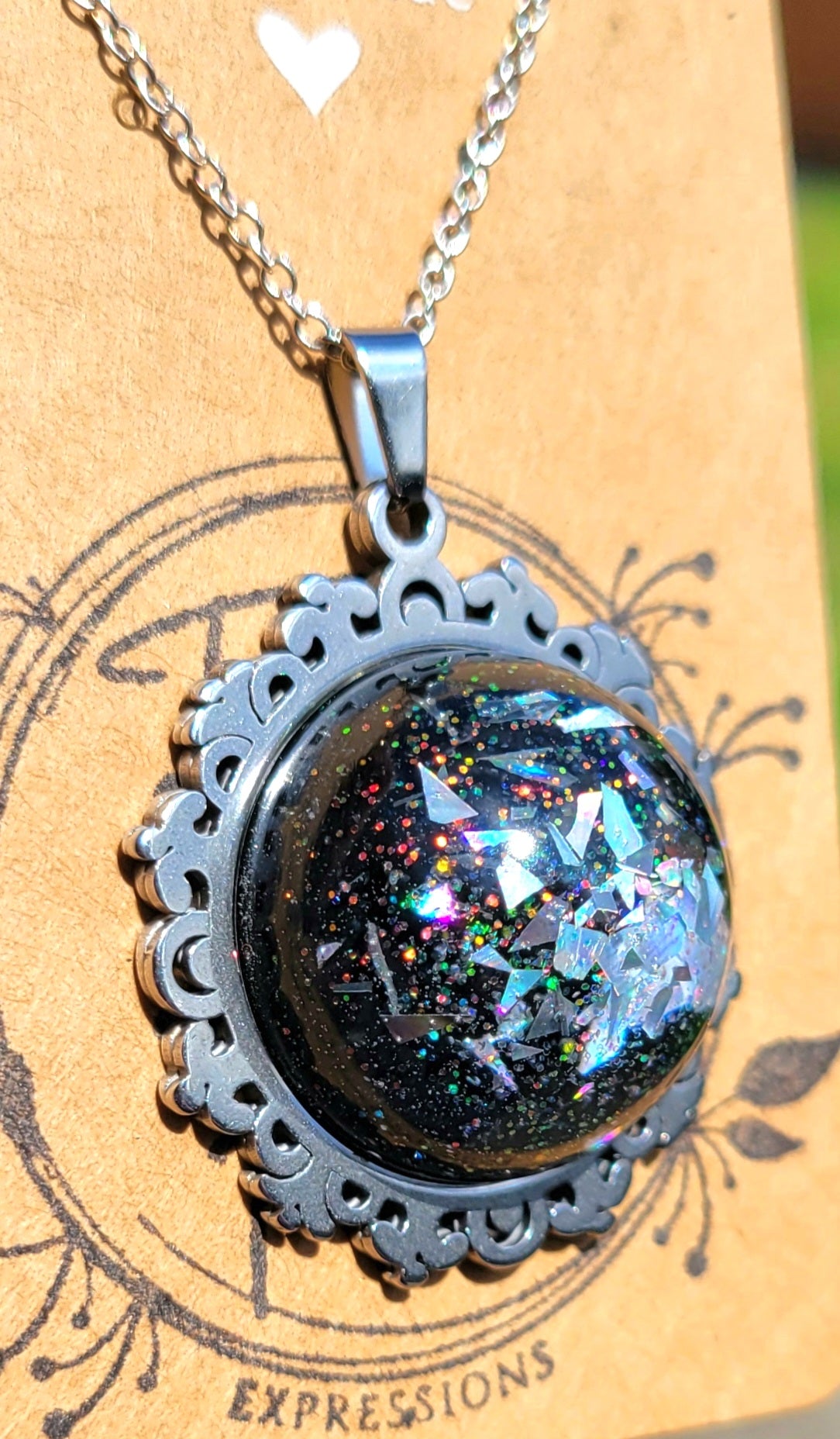 Handmade Resin Art Pendant with 20 inch silver plated necklace chain.