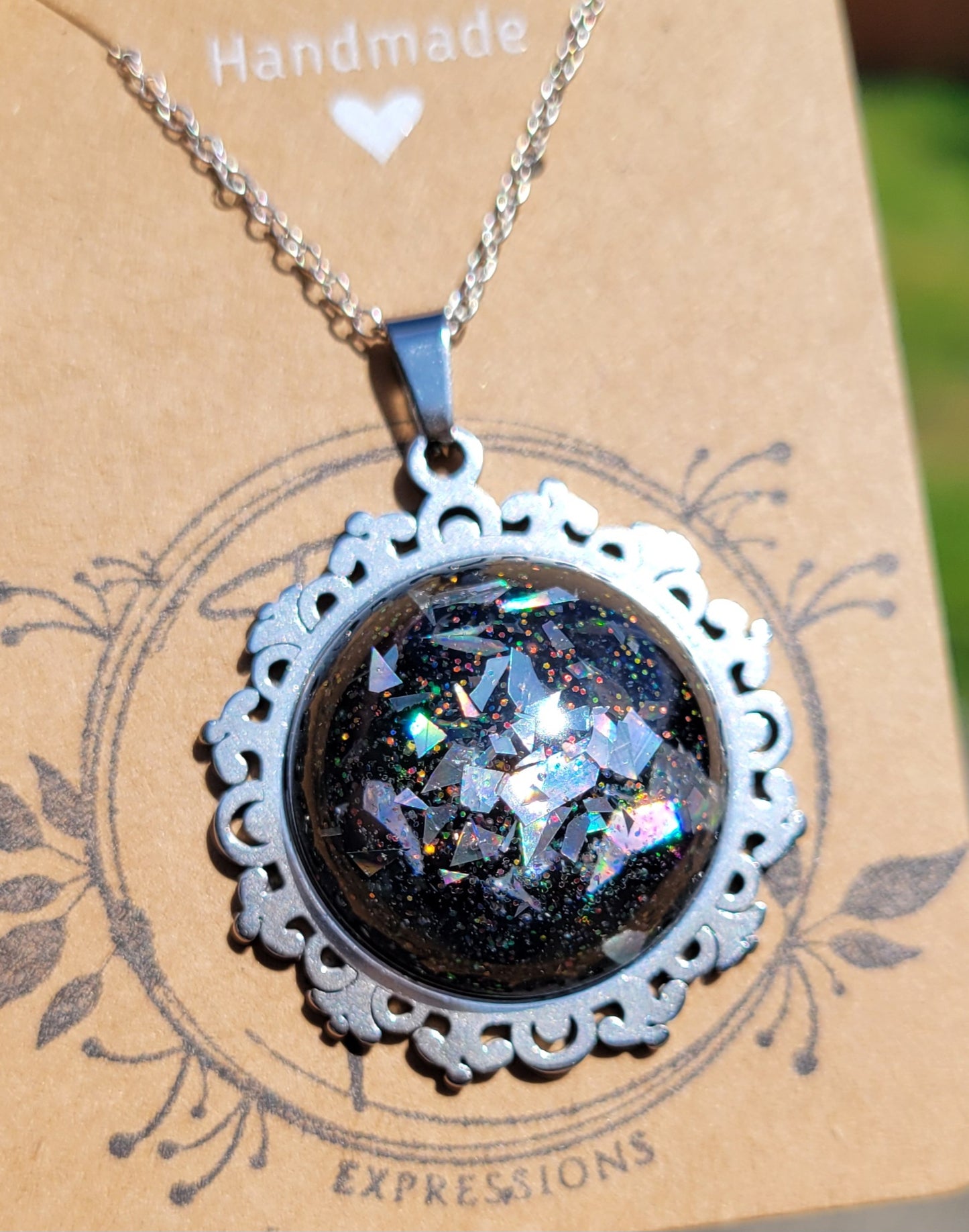 Handmade Resin Art Pendant with 20 inch silver plated necklace chain.