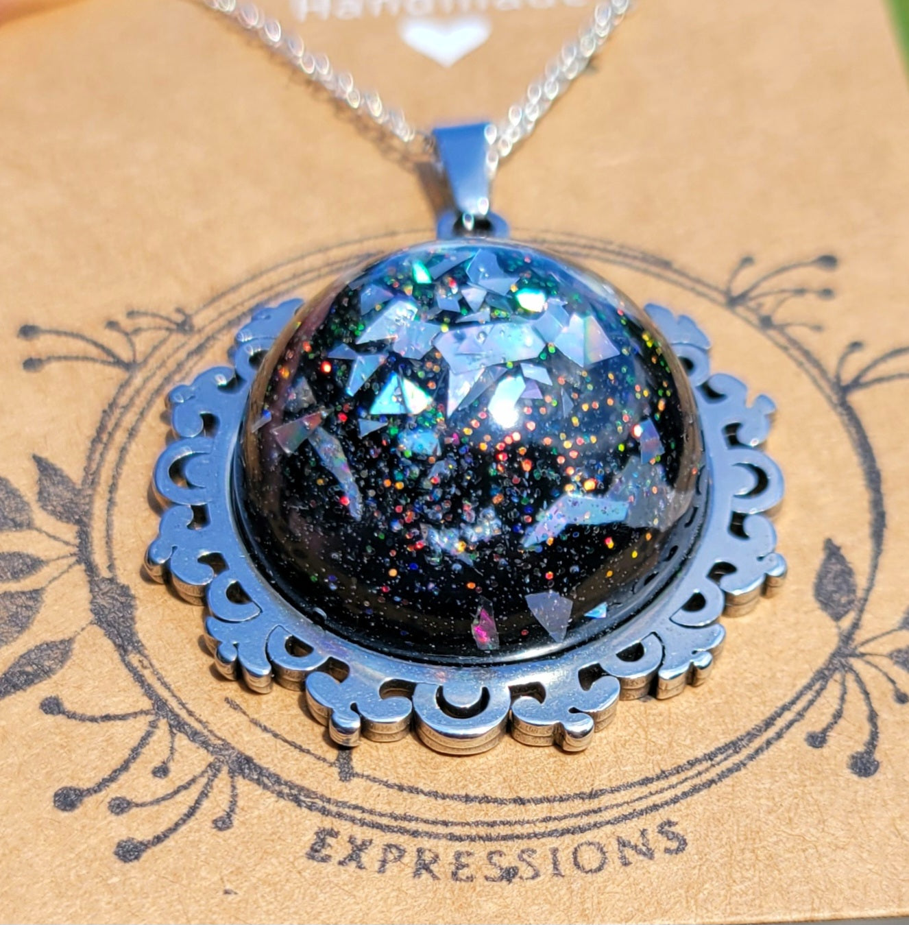 Handmade Resin Art Pendant with 20 inch silver plated necklace chain.