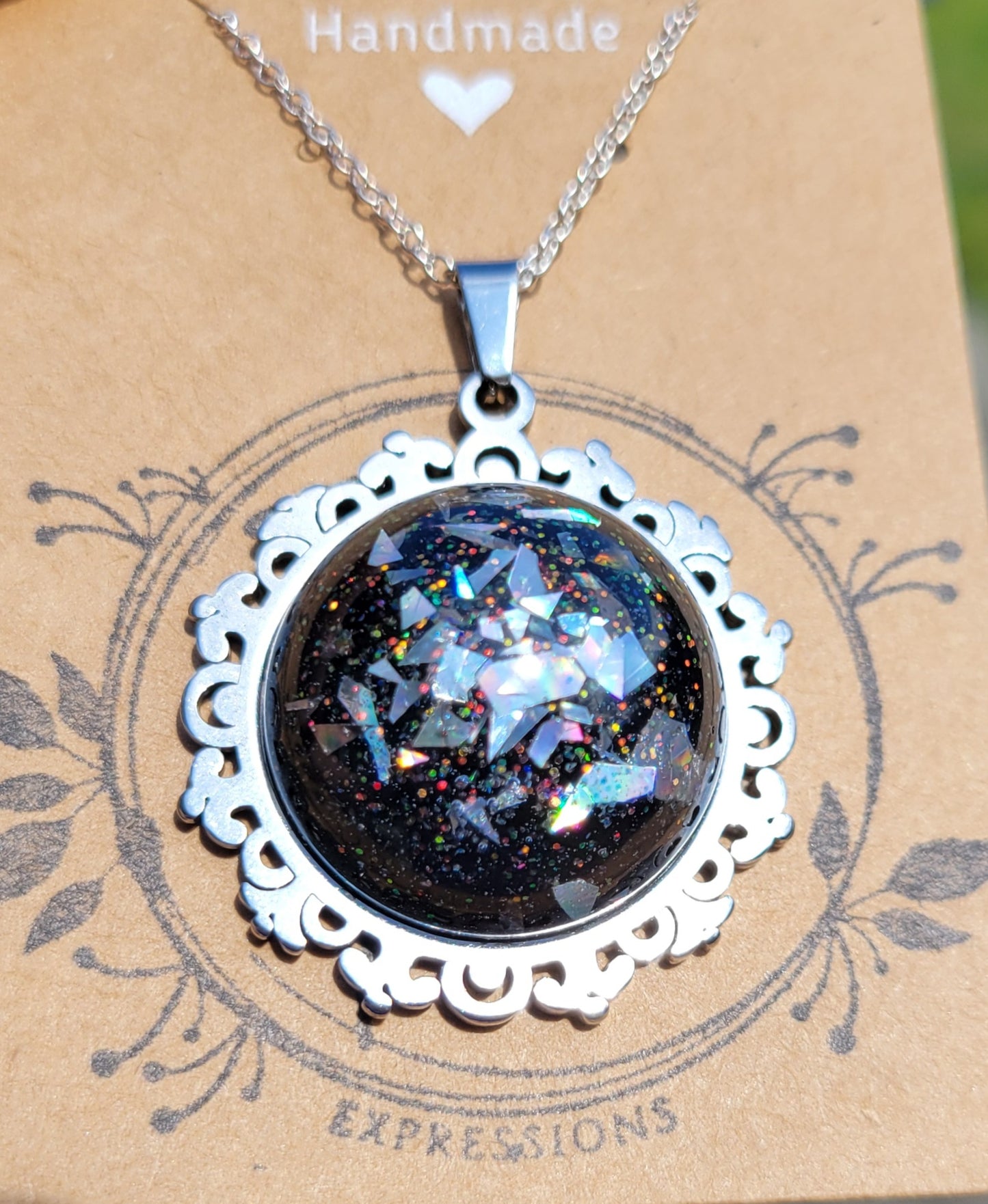 Handmade Resin Art Pendant with 20 inch silver plated necklace chain.