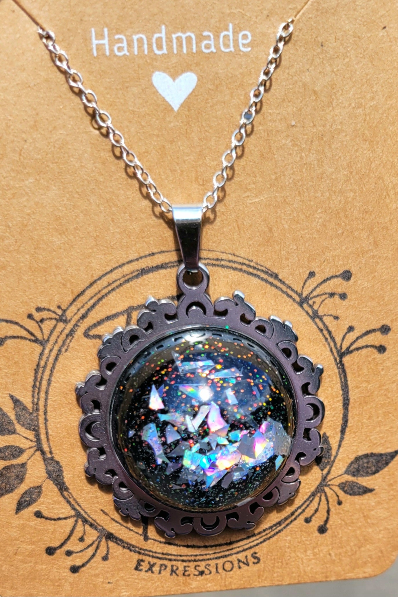 Handmade Resin Art Pendant with 20 inch silver plated necklace chain.