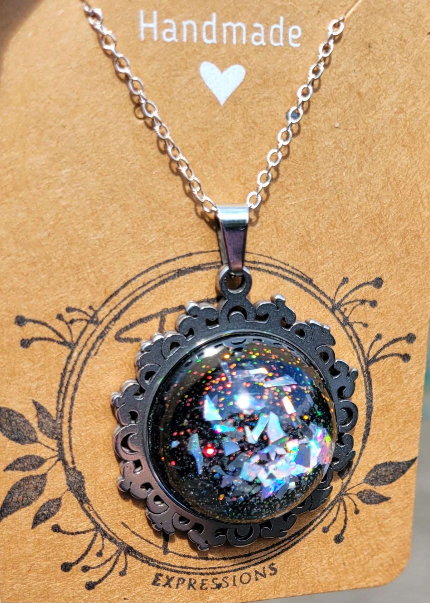 Handmade Resin Art Pendant with 20 inch silver plated necklace chain.