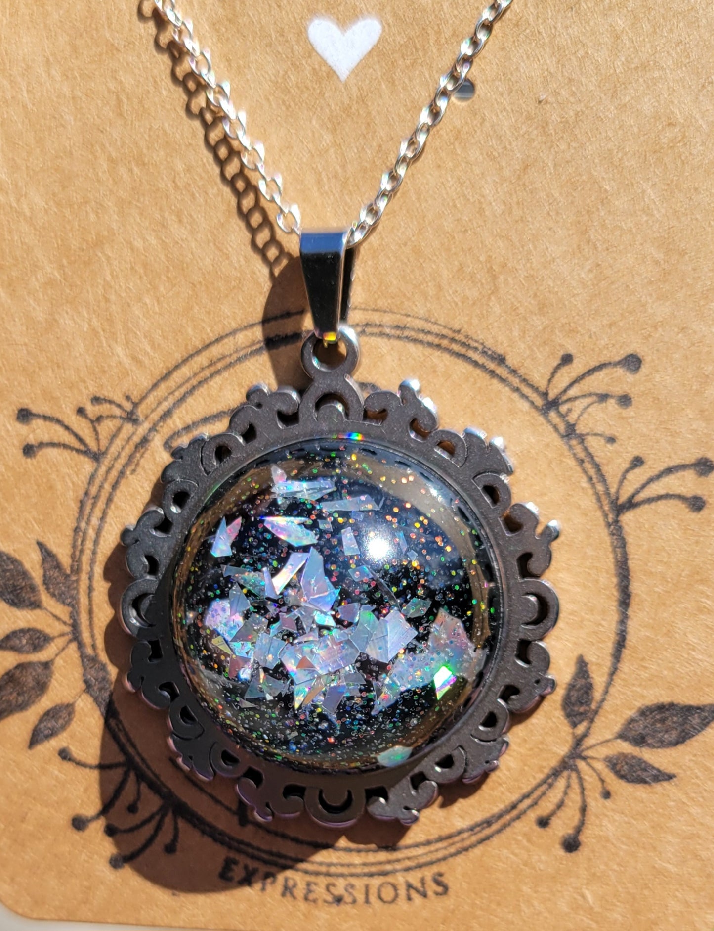 Handmade Resin Art Pendant with 20 inch silver plated necklace chain.