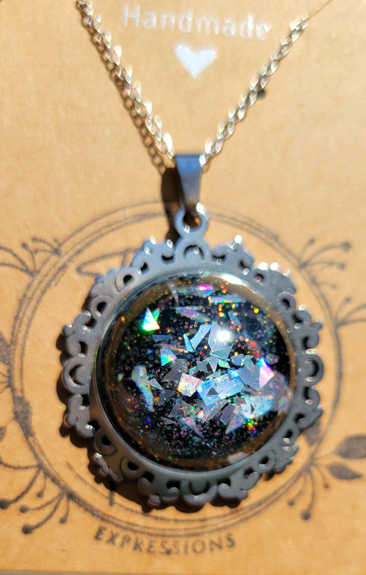 Handmade Resin Art Pendant with 20 inch silver plated necklace chain.