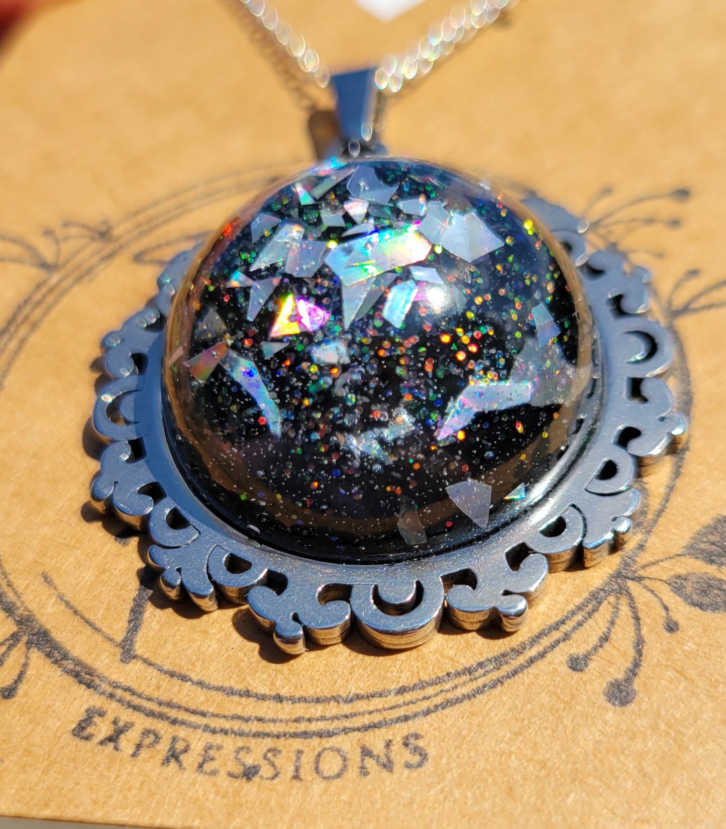 Handmade Resin Art Pendant with 20 inch silver plated necklace chain.